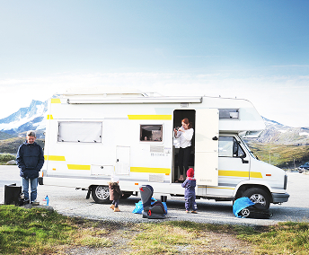 family outside an rv
